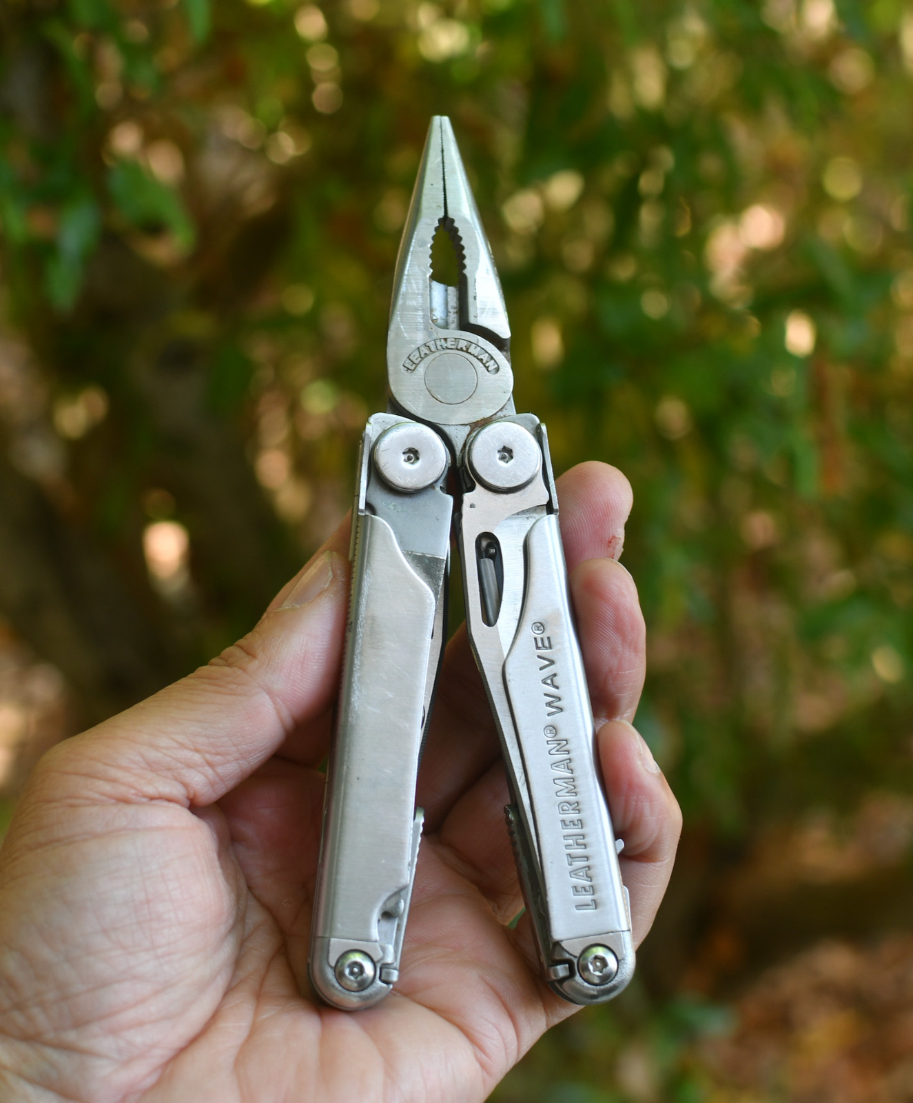 LeatherMan Wave Pocket Knife  Blades Rust