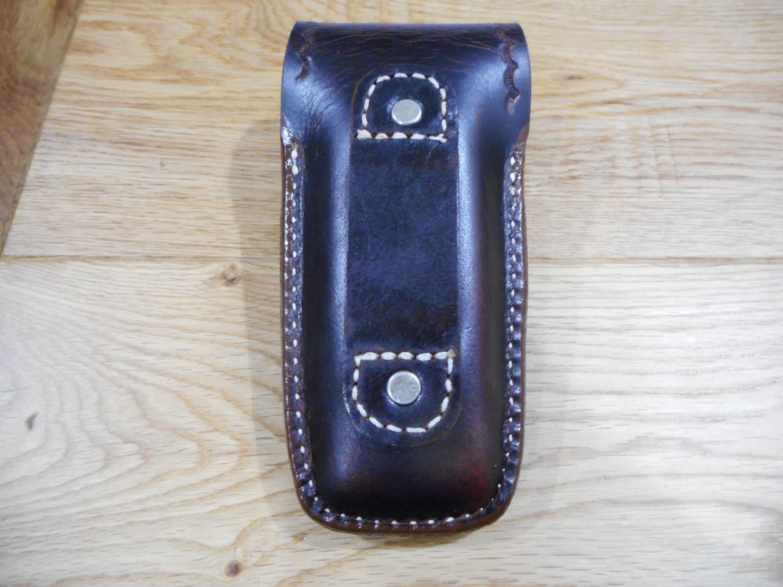Leatherman Surge. Crazy Horse leather sheath. Tooled flap. Sheath only.