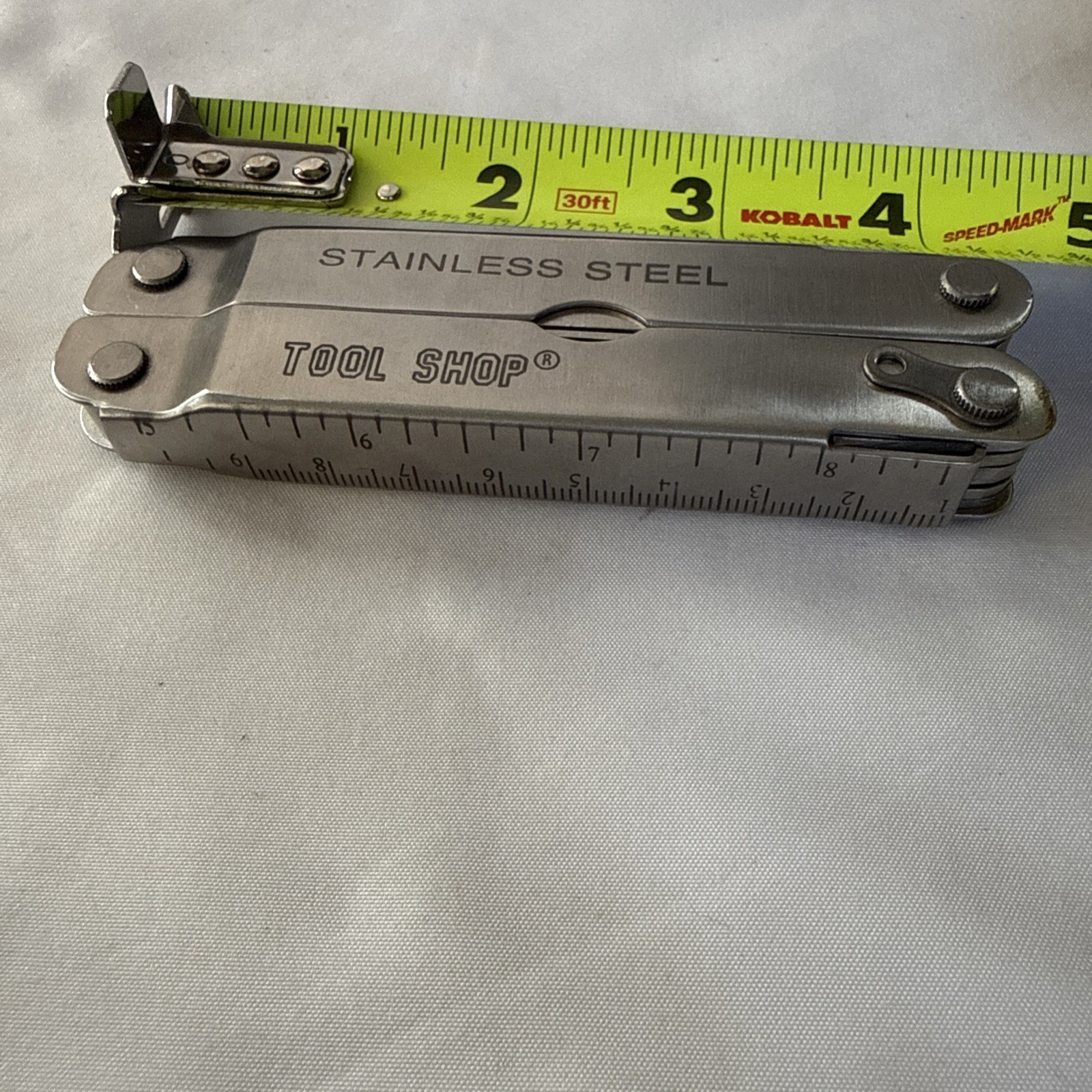 Tool Shop, multitool 13 tools plus!!! Nice tool!!! Not branded Stainless Steel