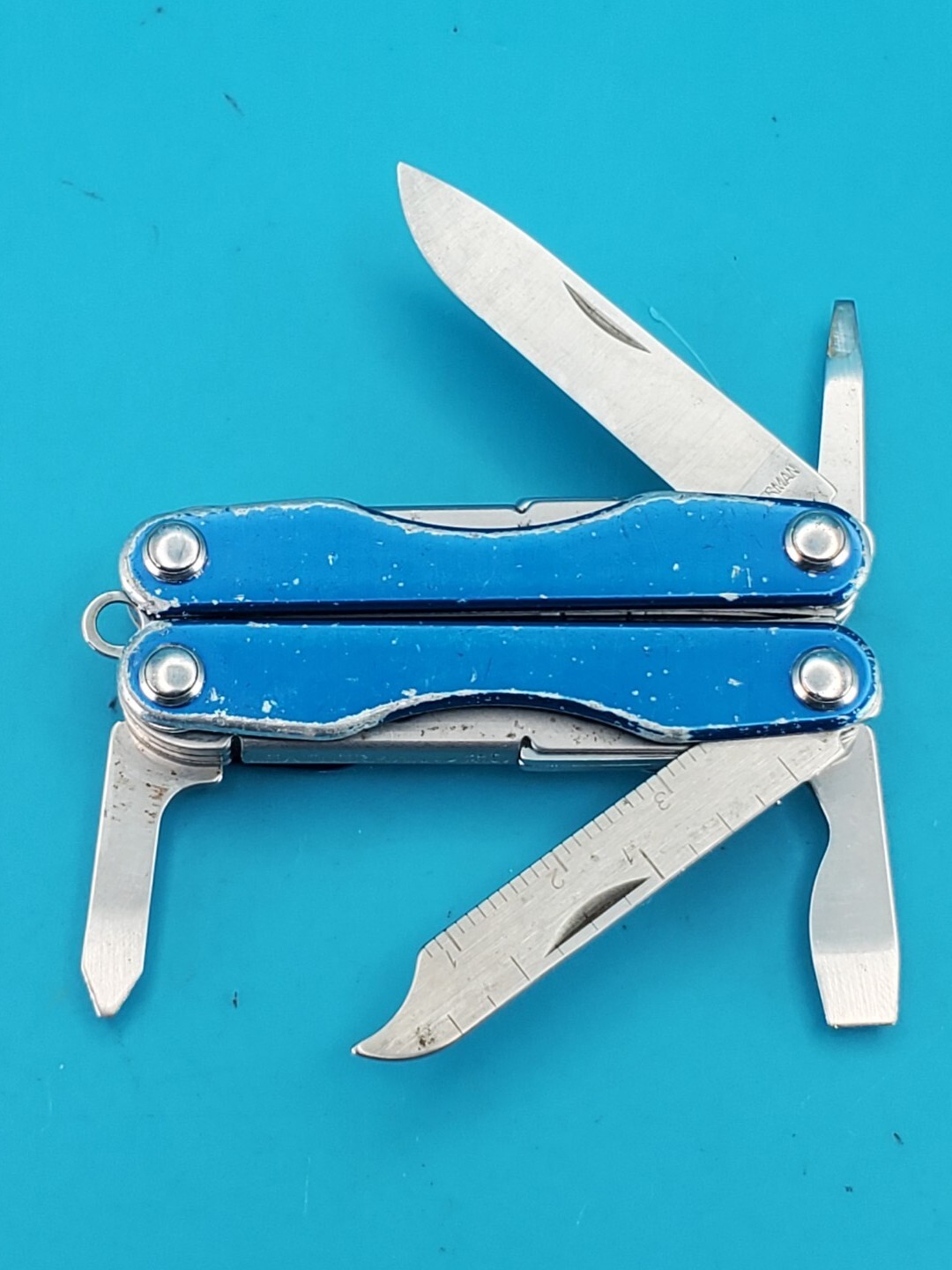 Leatherman “Squirt S4” Stainless Steel Multi Tool! BLUE!