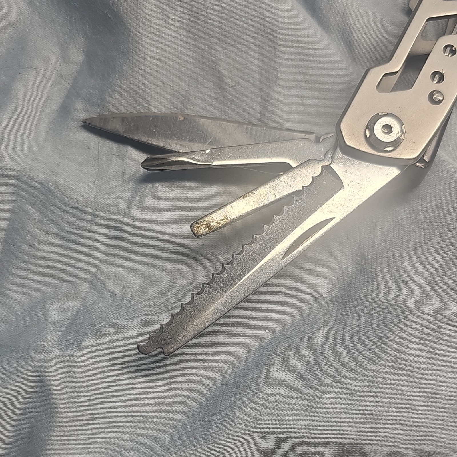 Silver Stainless Steel Multi-Tool with 7 Tools: Plier, Knife, File