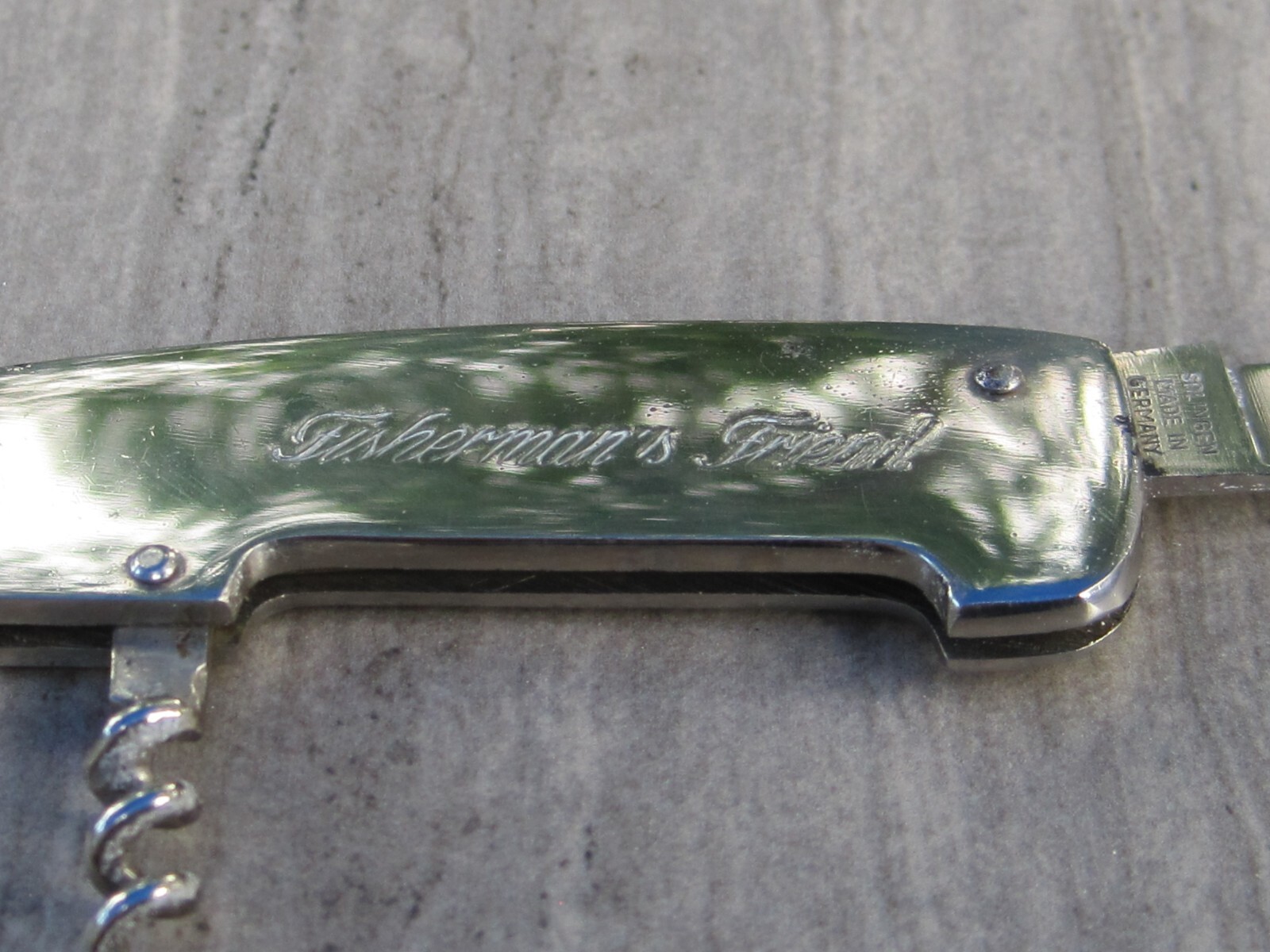 FISHERMAN’S FRIEND multi-tool (no sheath) and bonus Camillus pocketknife