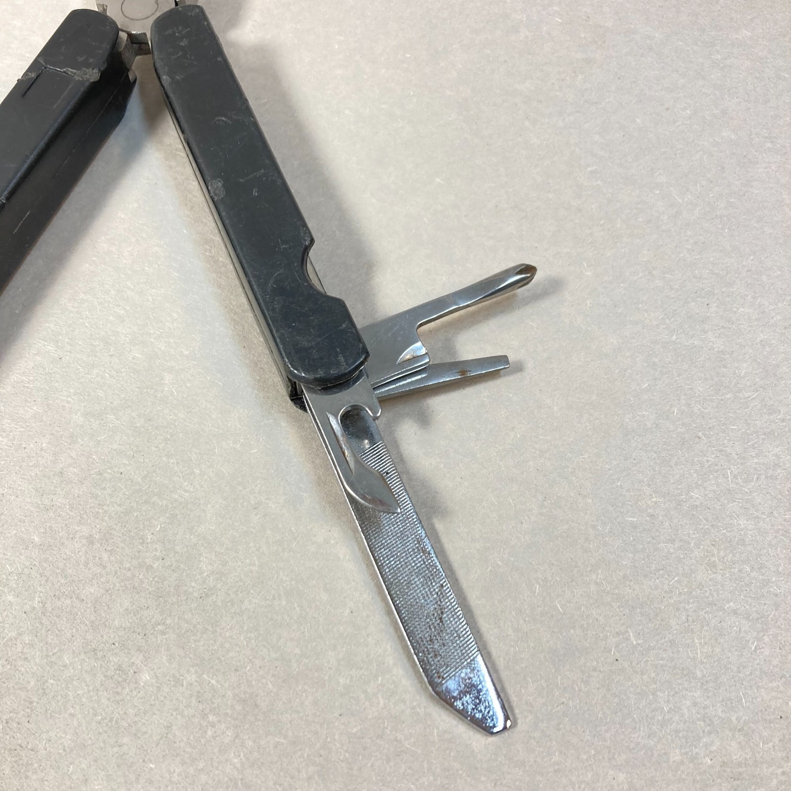 Folding Multi Tool 9 Functions w/ Knife Pliers Screwdrivers