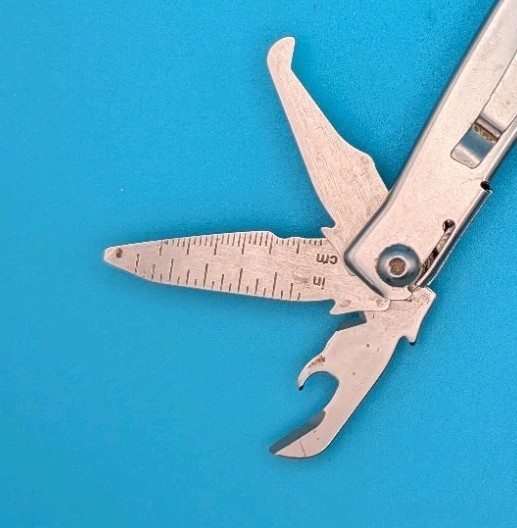 Leatherman Rev 3.8″ Multi-Tool, Stainless! *SOME RUST ON ITEM*