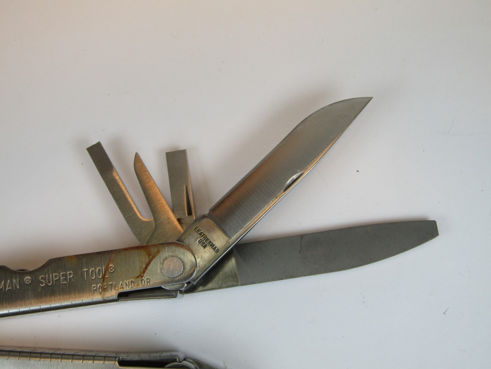 Leatherman Super Tool + Leatherman Micra Multi Tool