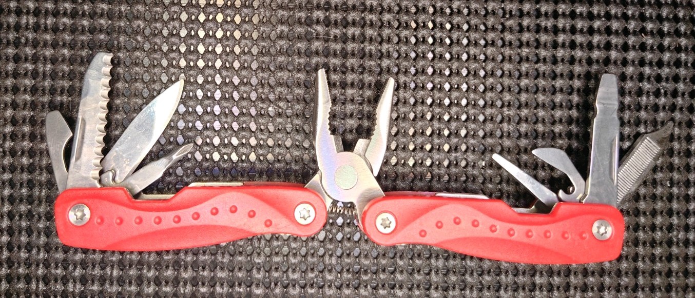 Small Multi tool With Needle Point Spring Plyers Red Used