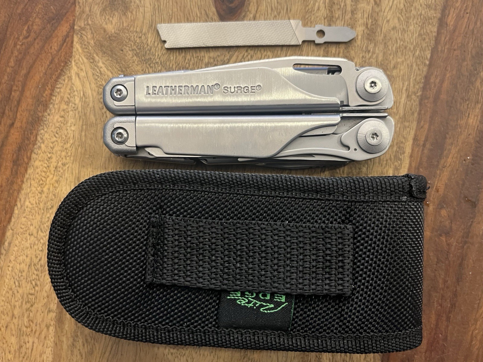 Leatherman Surge Multi-Tool Black Oxide Excellent Cond w/Sheath & Extra File