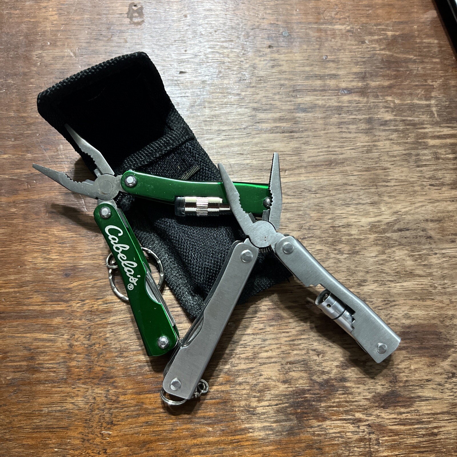 Lot Of 2 Multi-Tools Flashlight Key Chain Pliers Cabelas And Other