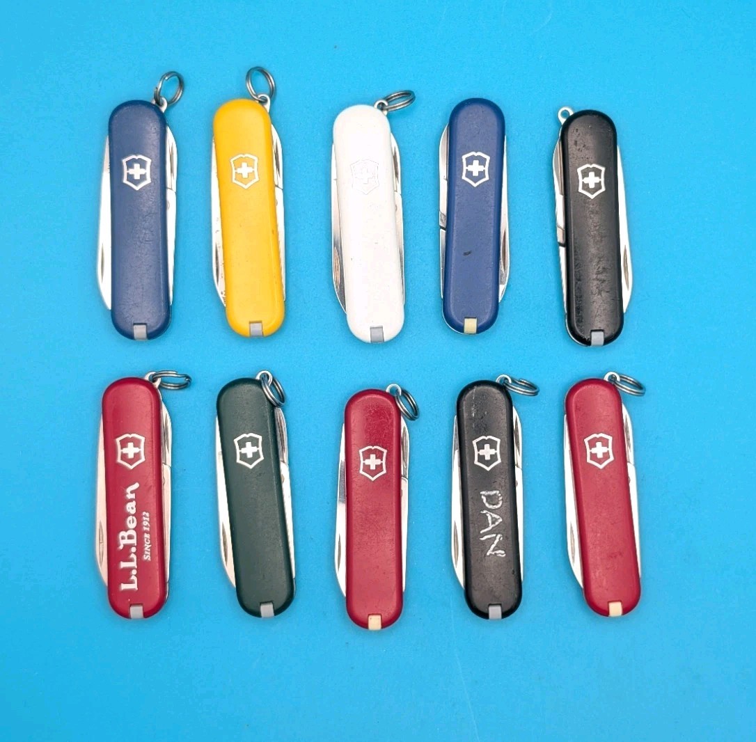 Lot of 10 Victorinox Classic Swiss Army Knife Multi Tools!