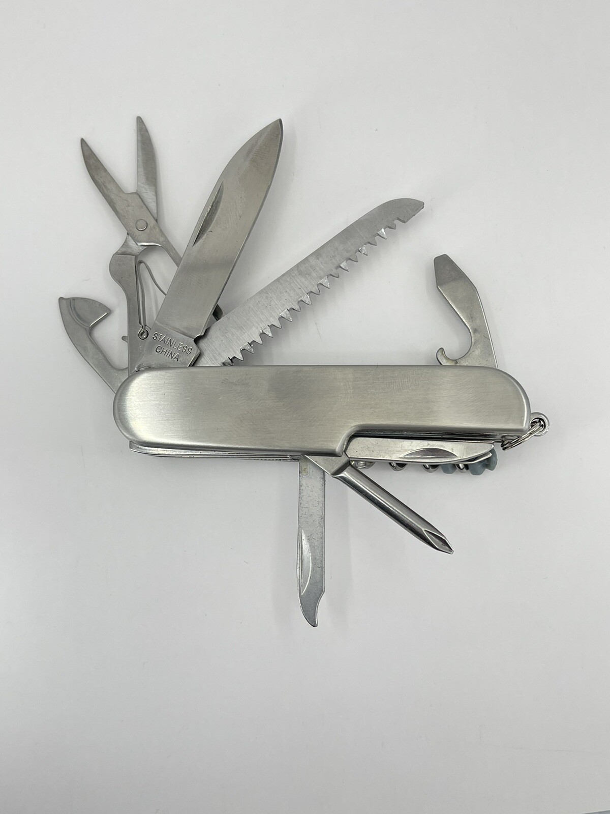 Younkers multi tool Pocket Knife can opener cork screw wood saw scissors file