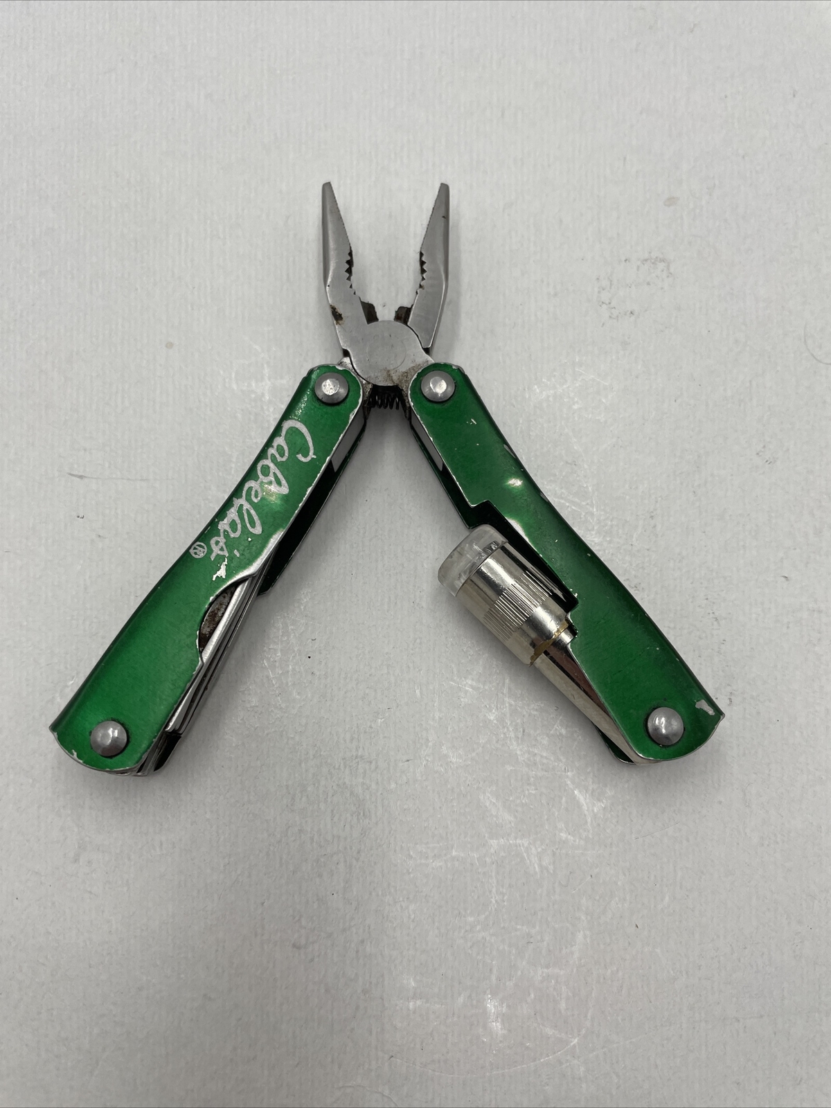 Cabela’s Mini Multi-tool w/ LED flashlight green