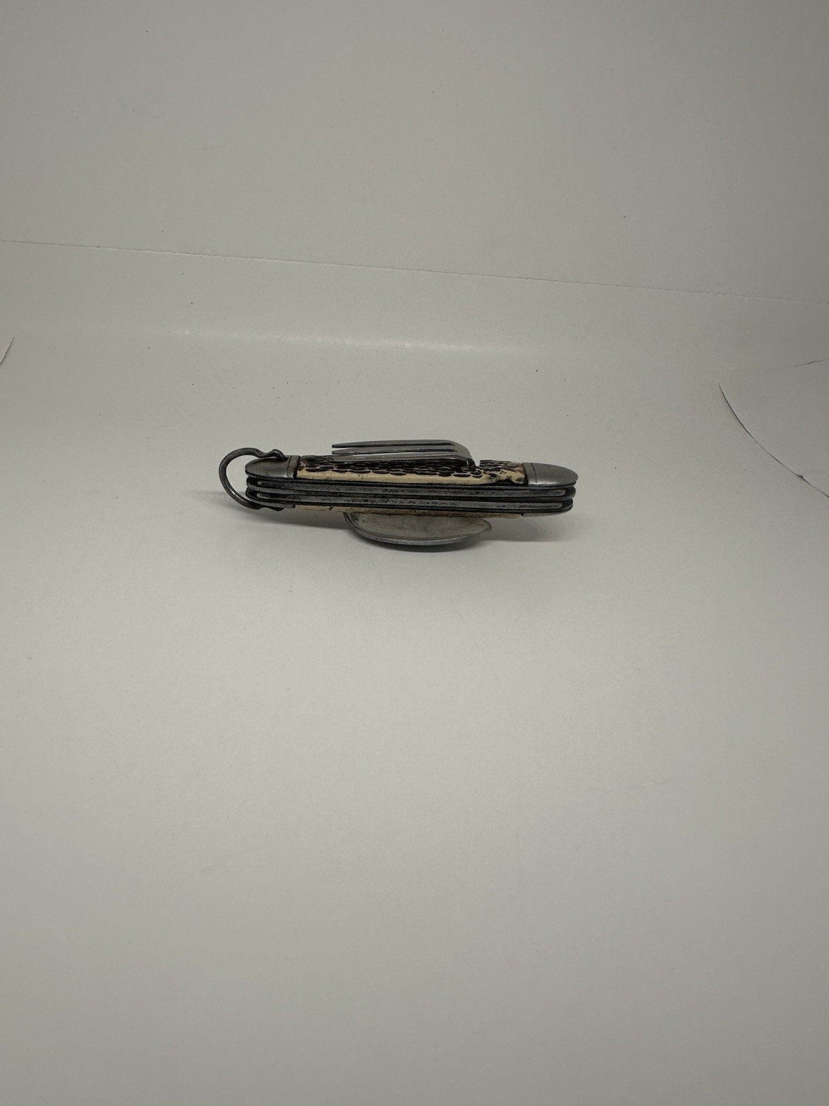 Silver Metal Multi-Tool with Knife, Fork, Spoon, Bottle Opener Straight Edge