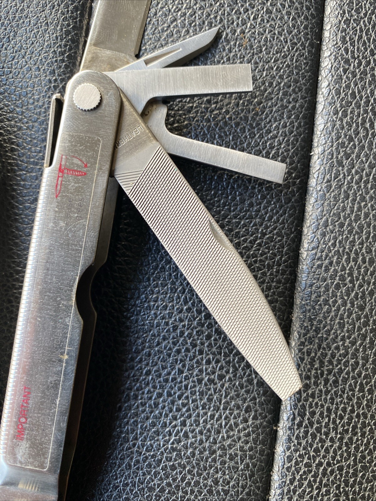 Multi-tool With Pocket Clip. Leatherman 832127 Rev Stainless Steel