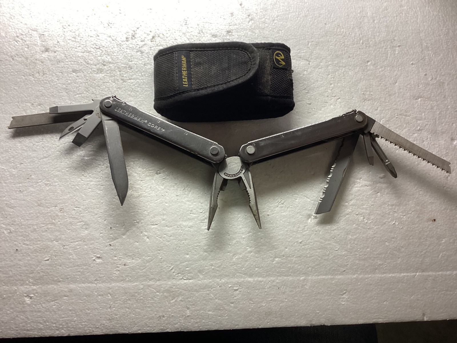 VINTAGE LEATHERMAN CORE MULTITOOL with nylon case.