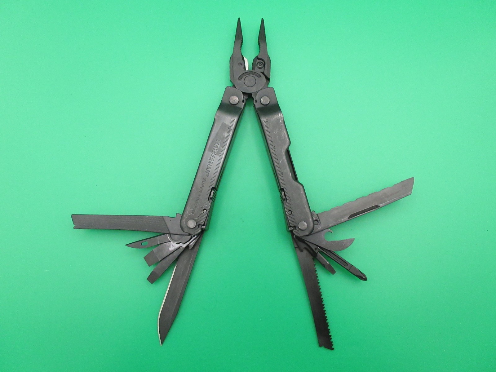 Leatherman Super Tool 300 Black Oxide Folding Multi Tool Knife Saw #60A