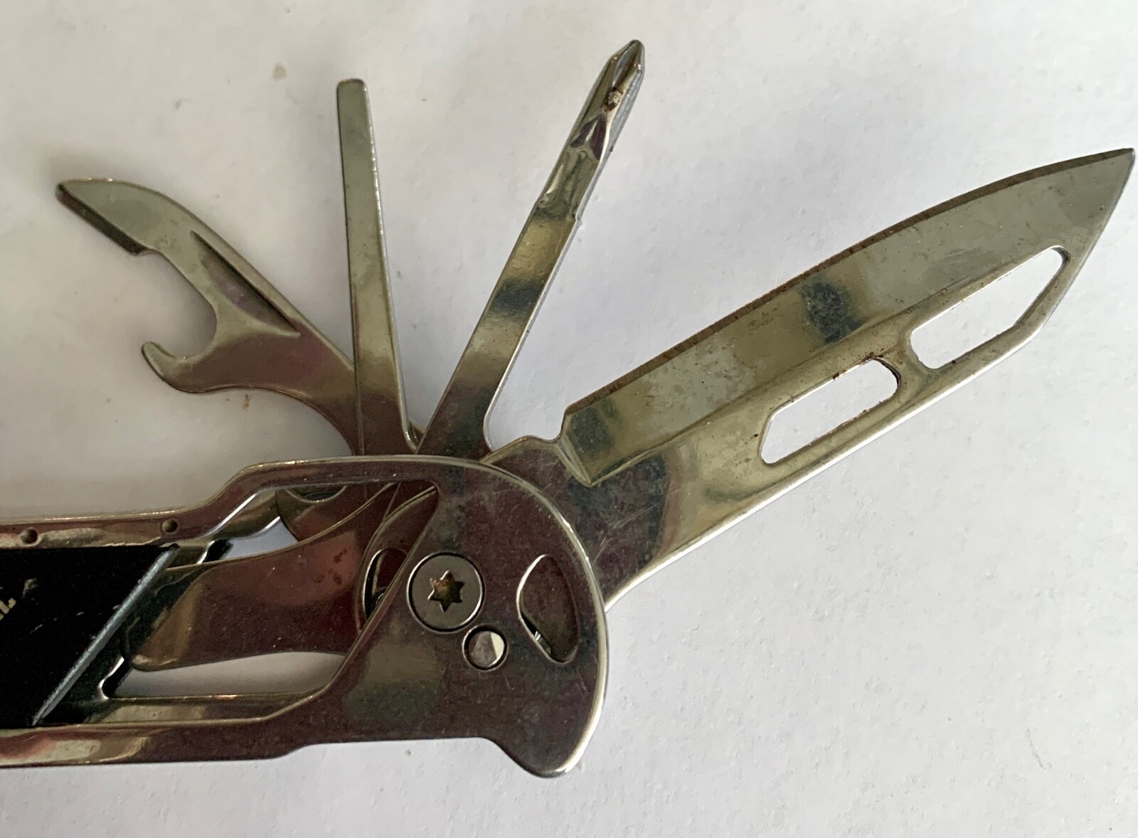PRO-4 POWER TACTICAL 12-IN-1 MULTI-TOOL PLIERS, CHROME TONE METAL & BLACK
