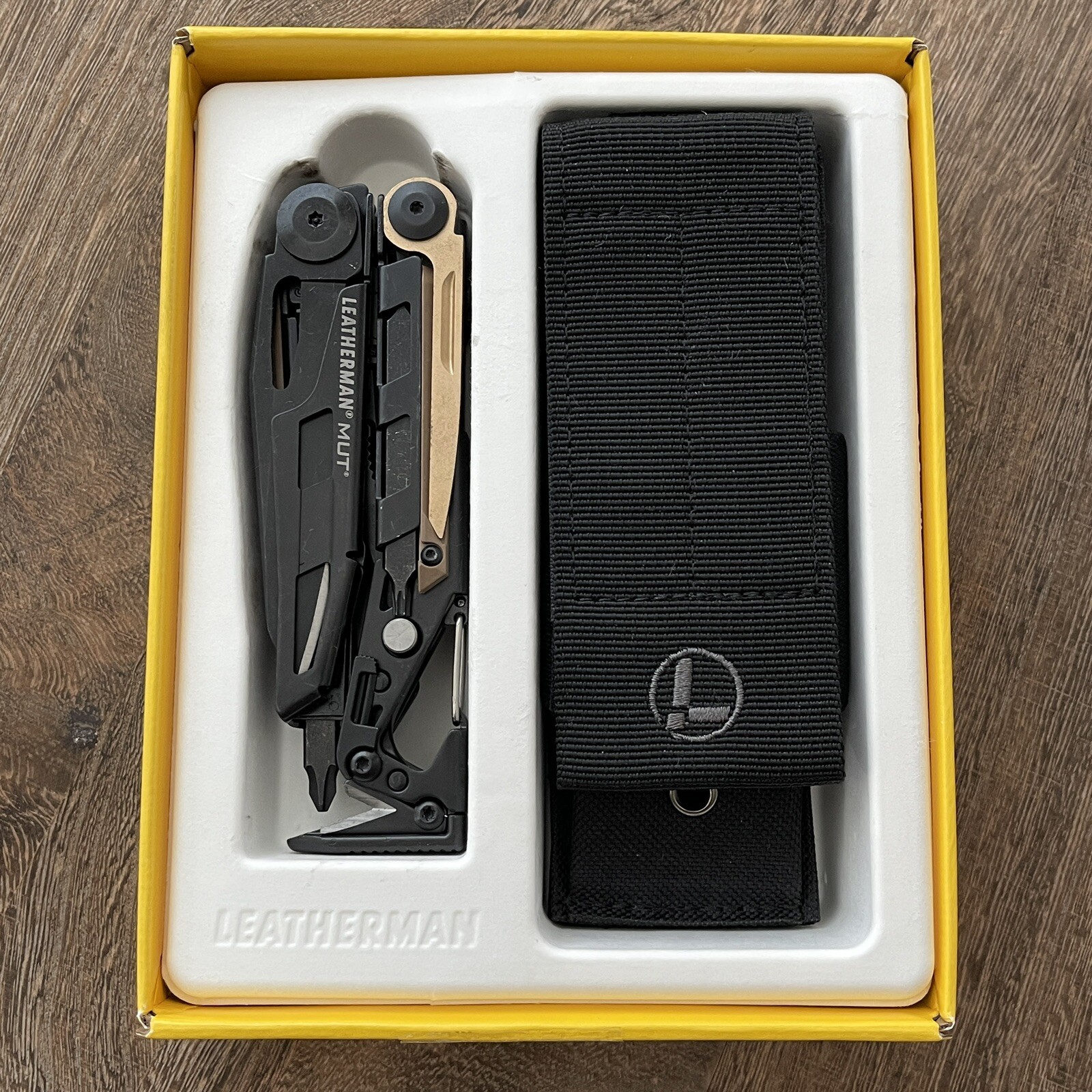 Leatherman MUT Black multi tool, black molle sheath. Brand new