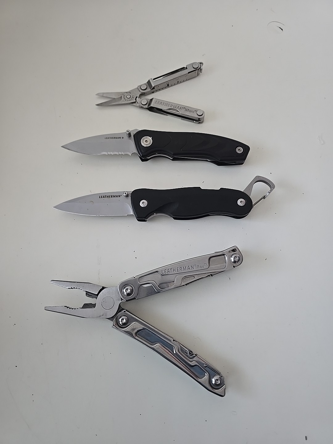 Lot of 4 – Leatherman Multi-Tools – Micra, C33, C301, REV