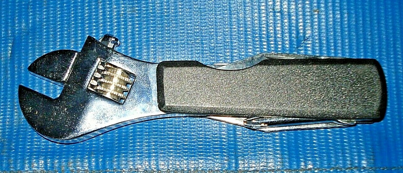 Multi-Tool Adjustable Wrench, Knifes, scissors Screwdrivers, awl, bottle opener