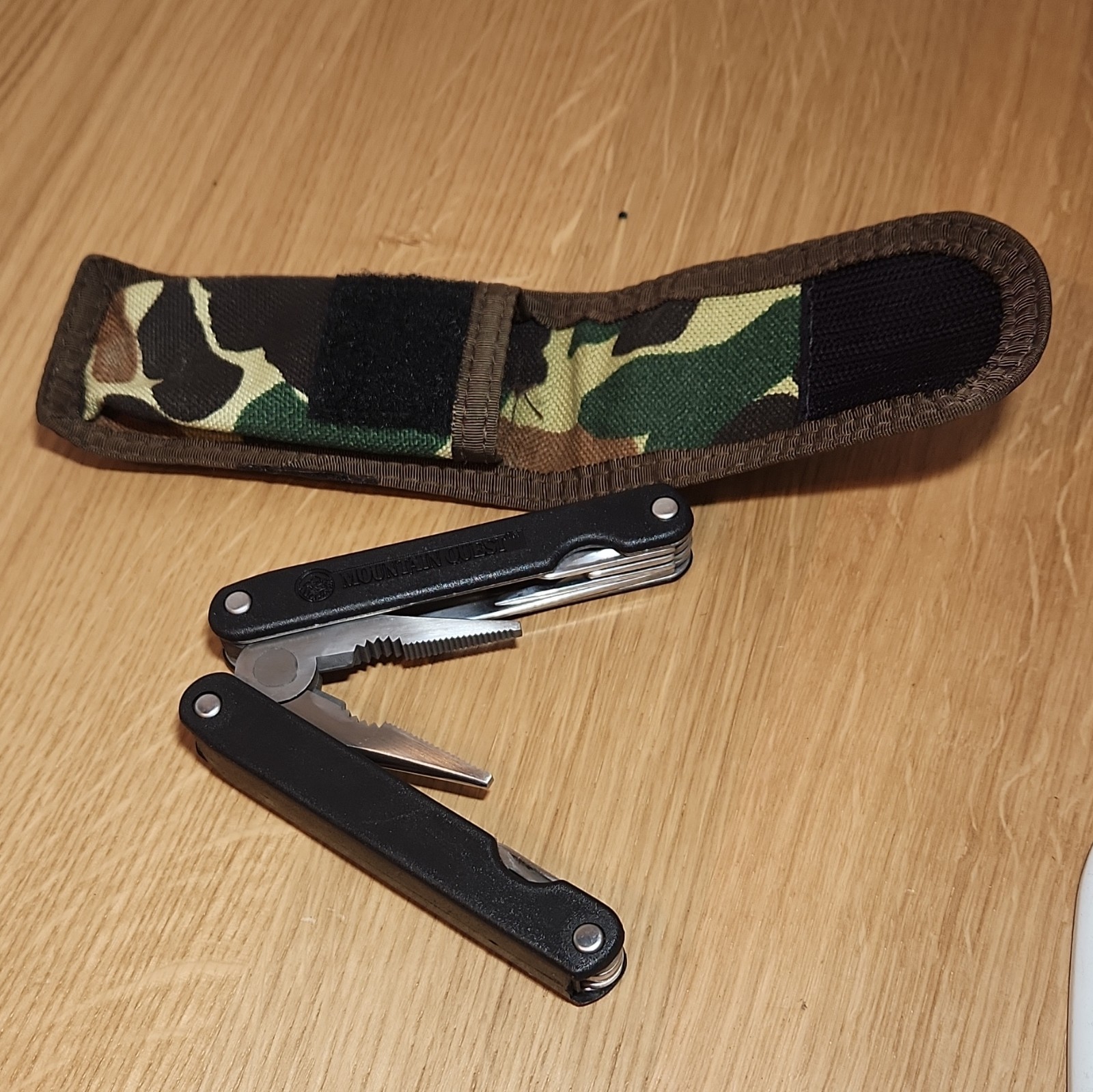 Mountain Quest 9-in-1 Folding Multi-Tool, Stainless 2in Blade, Camo Sheath