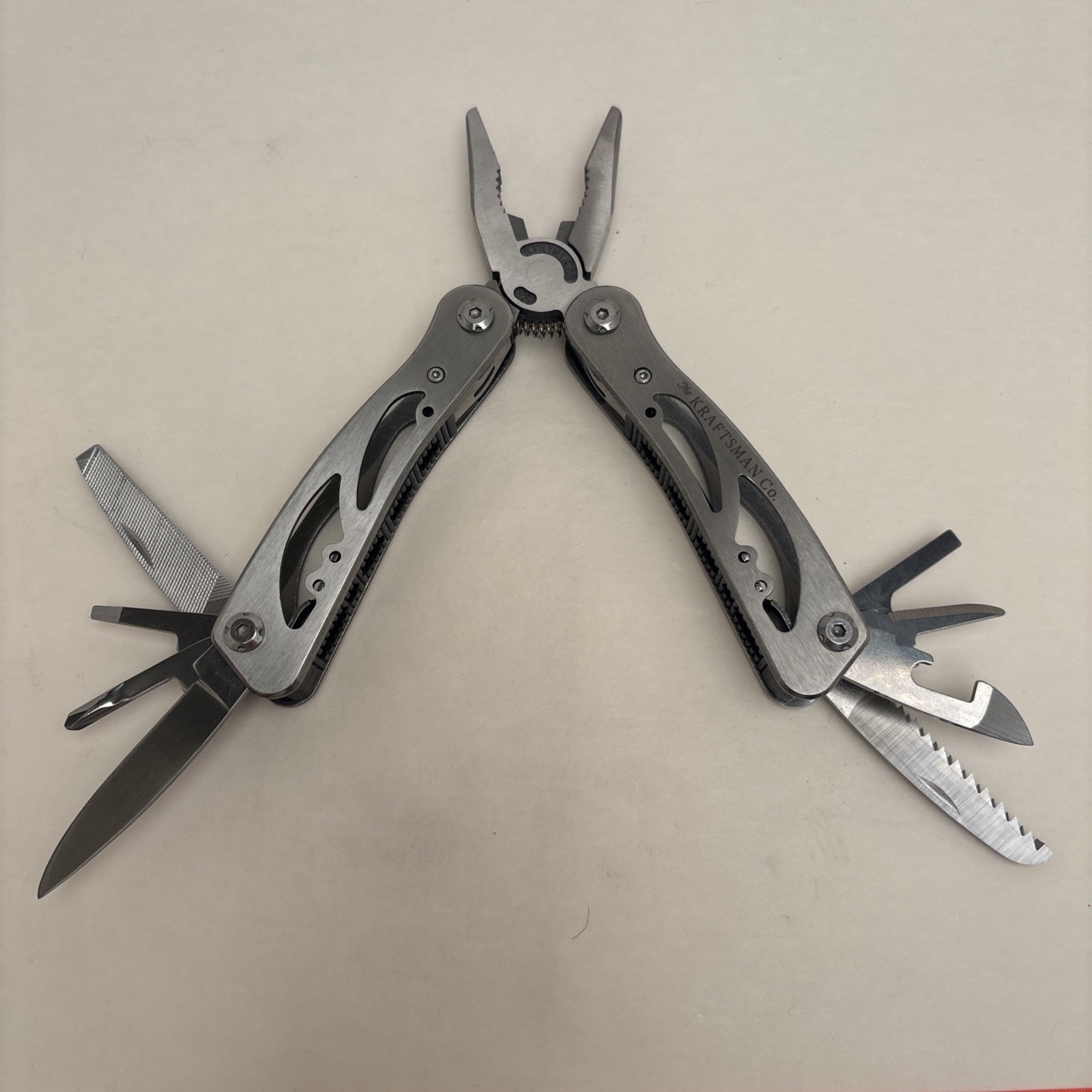 Kraftsman Multitool Silver Tone, Sheath Included. Camp Hunt Fish Survival Bugout