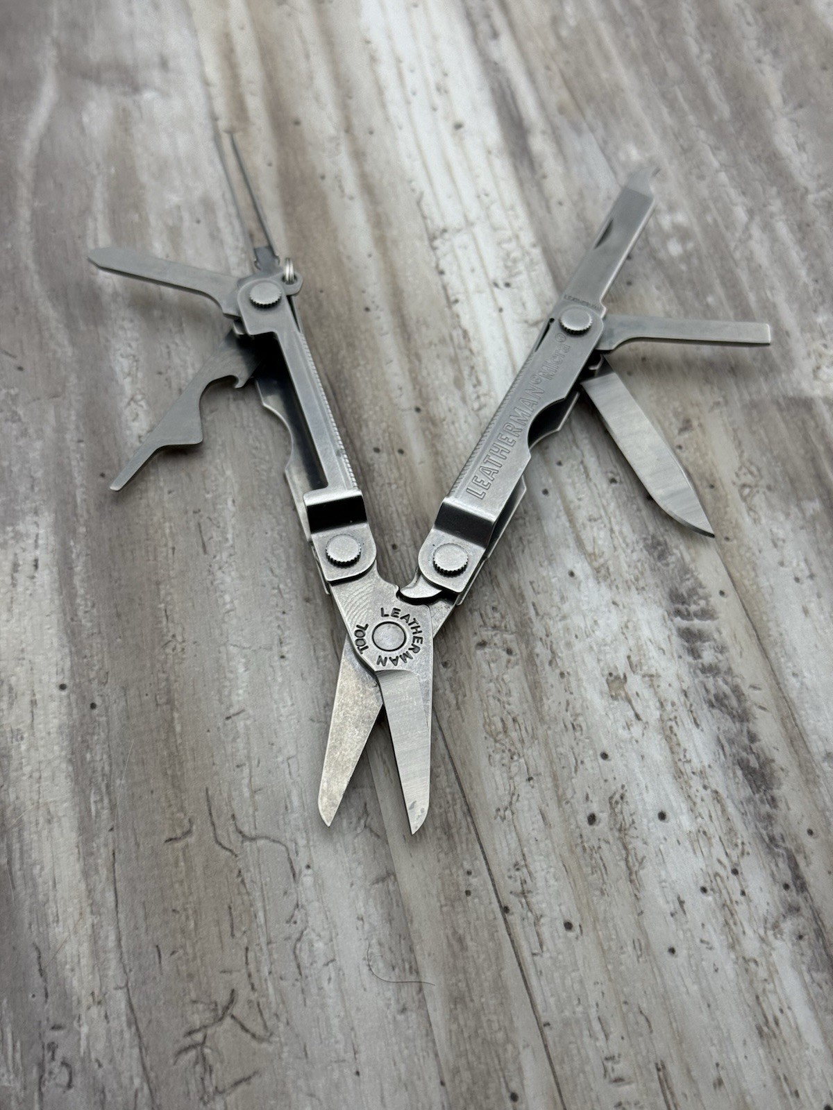 Leatherman Micra Multi-Tool Knife Scissors Key Ring Stainless Lexus logo