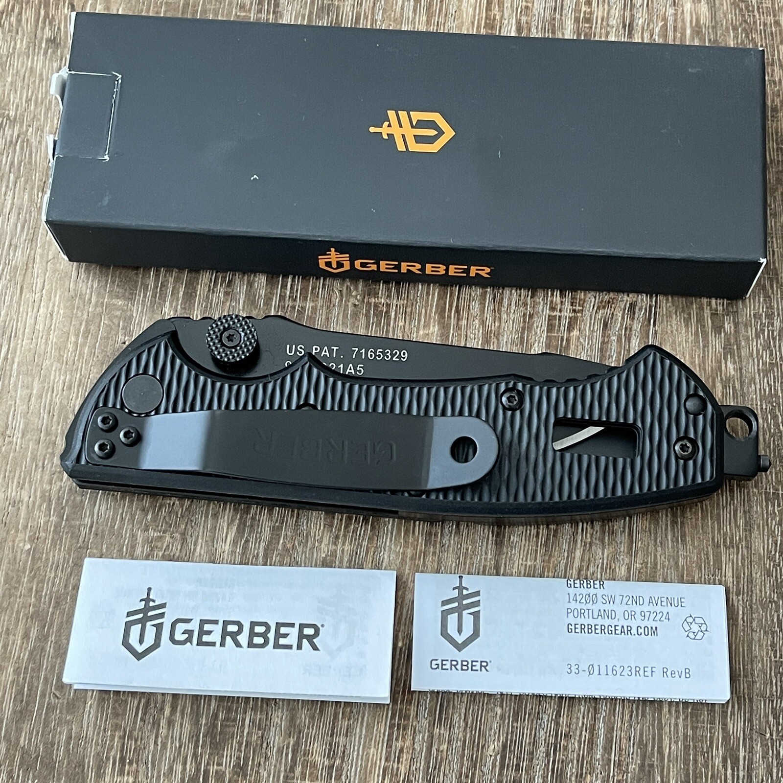 Gerber Hinderer rescue firefighter, paramedic knife/multi tool. Brand new in box