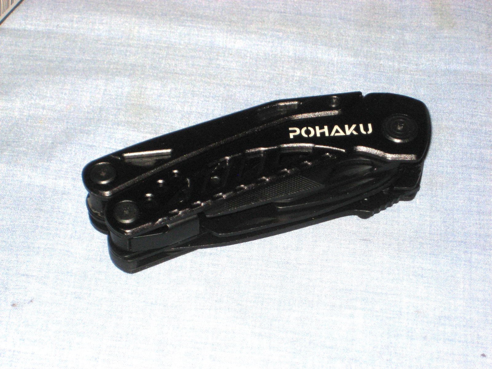 POHAKU BLACK MULTI-TOOL WITH PLIERS, KNIFE, SAW, FILE, SCREWDRIVERS – NEW