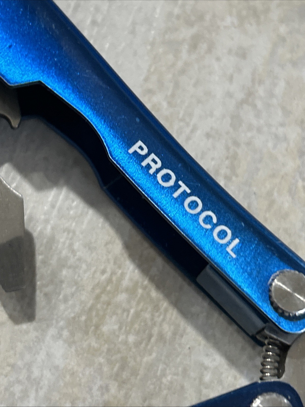 PROTOCOL 8 FUNCTION MINI MULTI TOOL WITH SHEATH – Pliers, Flashlight, Etc.