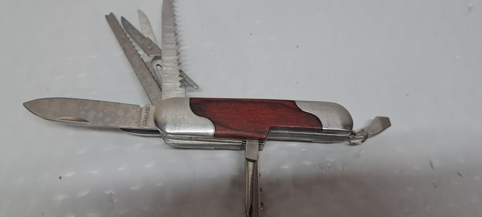 NRA LOGO SS MULTI TOOL WITH 12 TOOLS AND LANYARD LOOP 10/4/1
