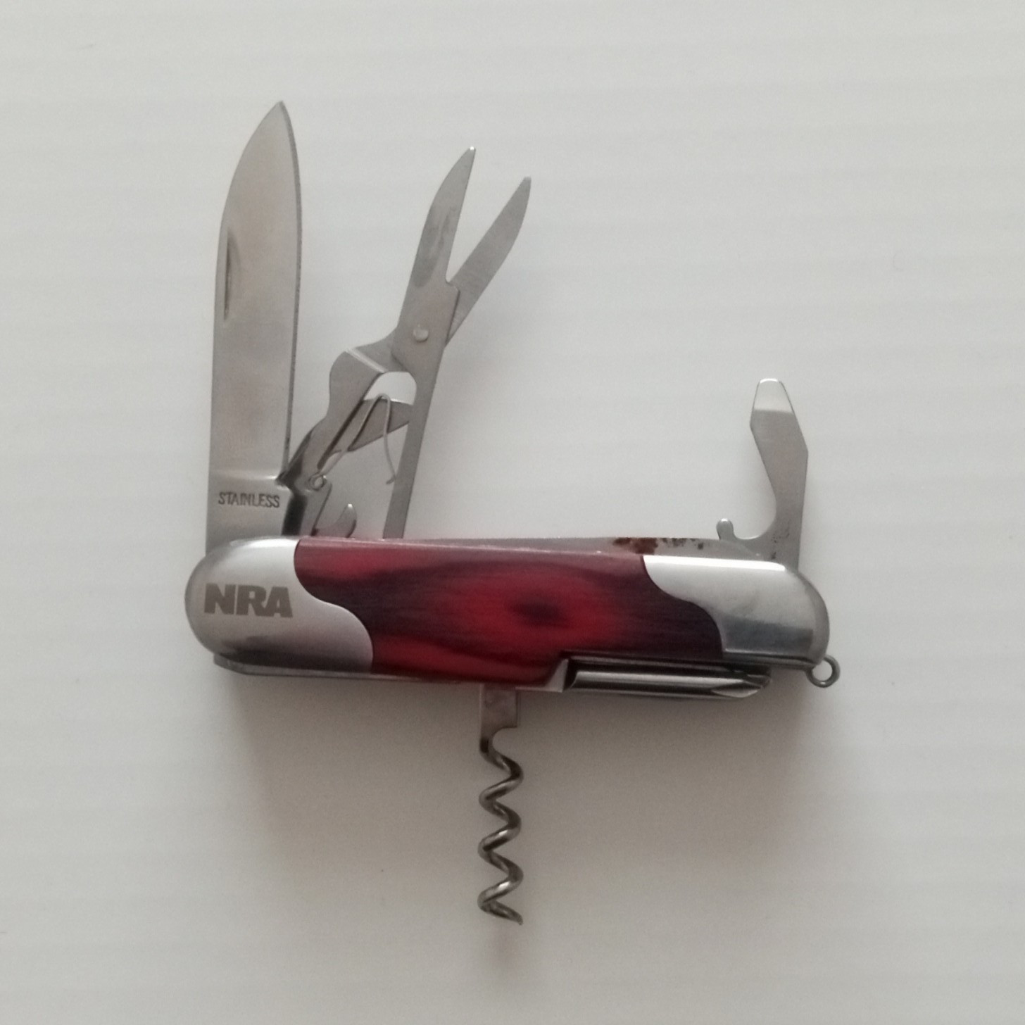 NRA Stainless Steel/Wood 5-in-1 Multi-Tool Knife 2.25″ Lanyard Ring