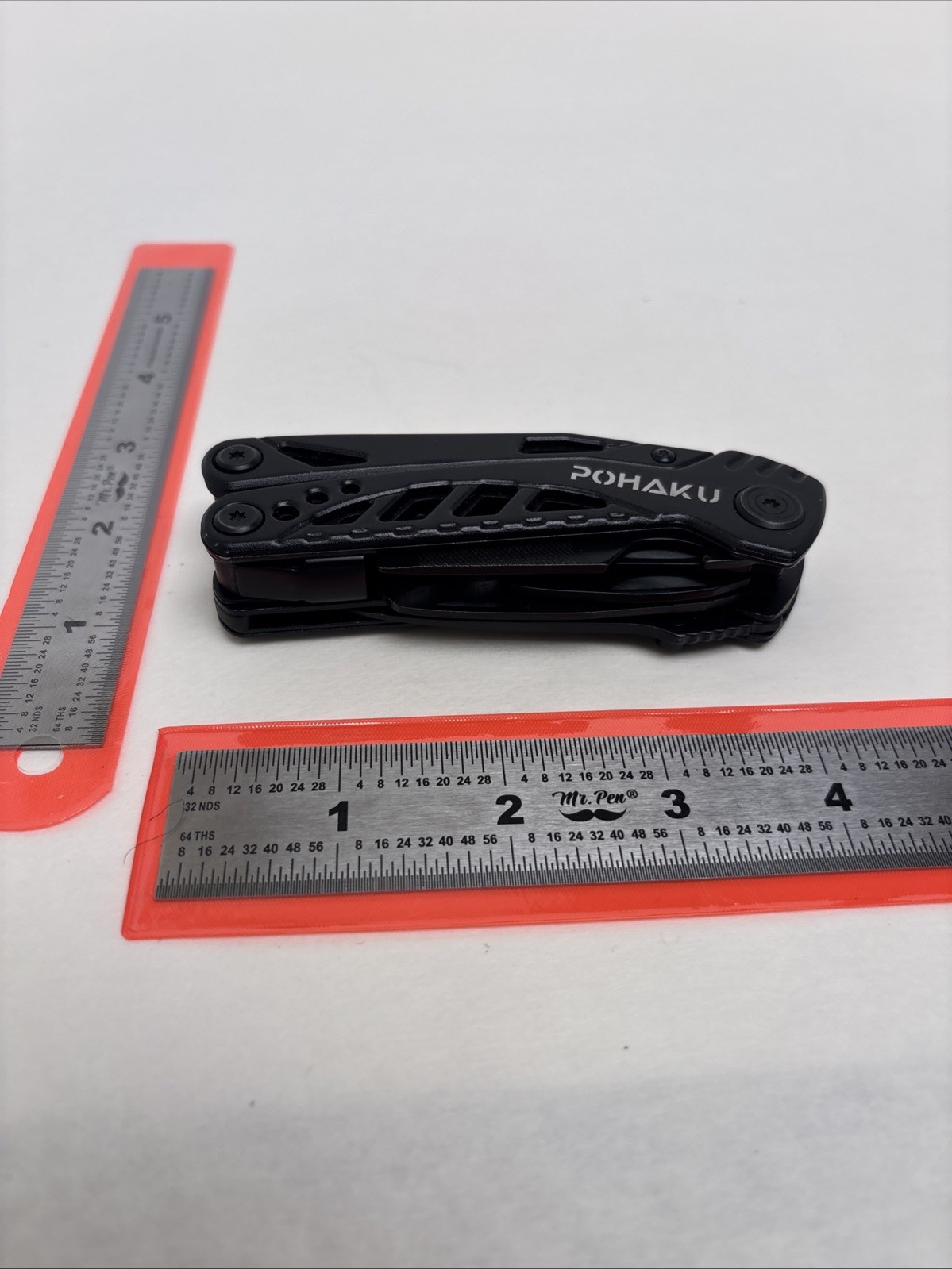 POHAKU BLACK MULTI-TOOL WITH PLIERS, KNIFE, SAW, FILE, SCREWDRIVERS