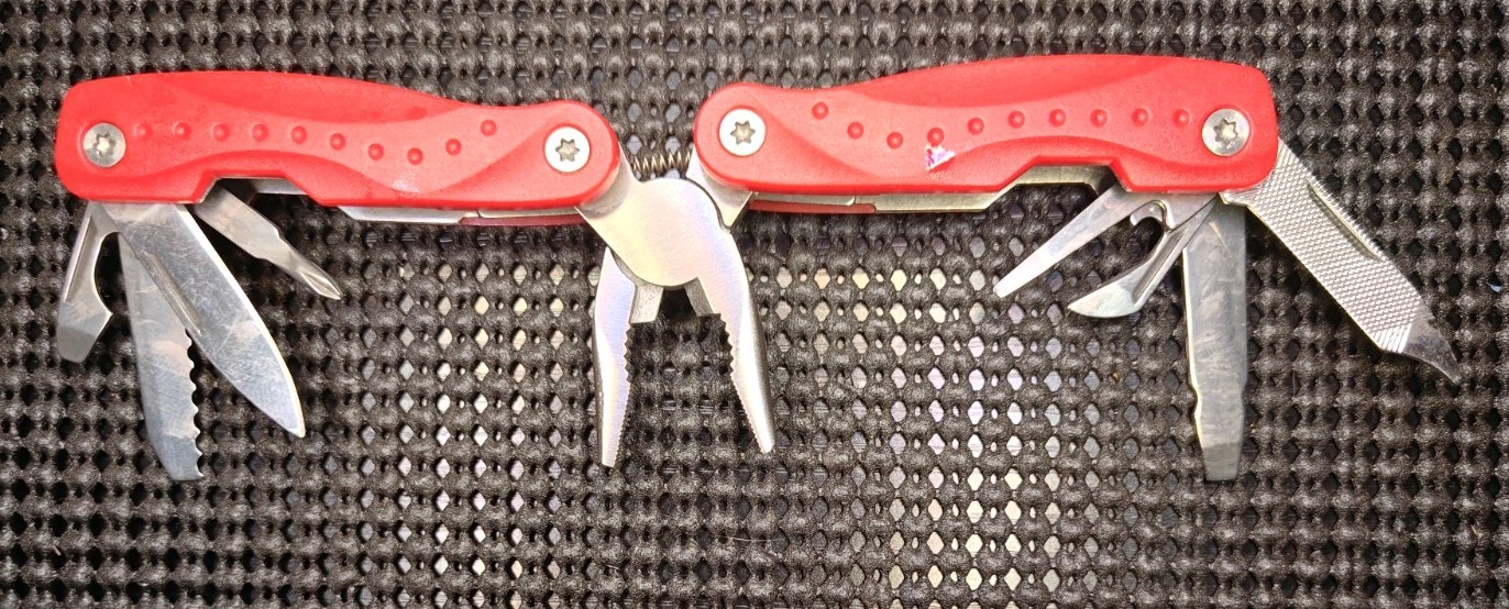 Small Multi tool With Needle Point Spring Plyers Red Used