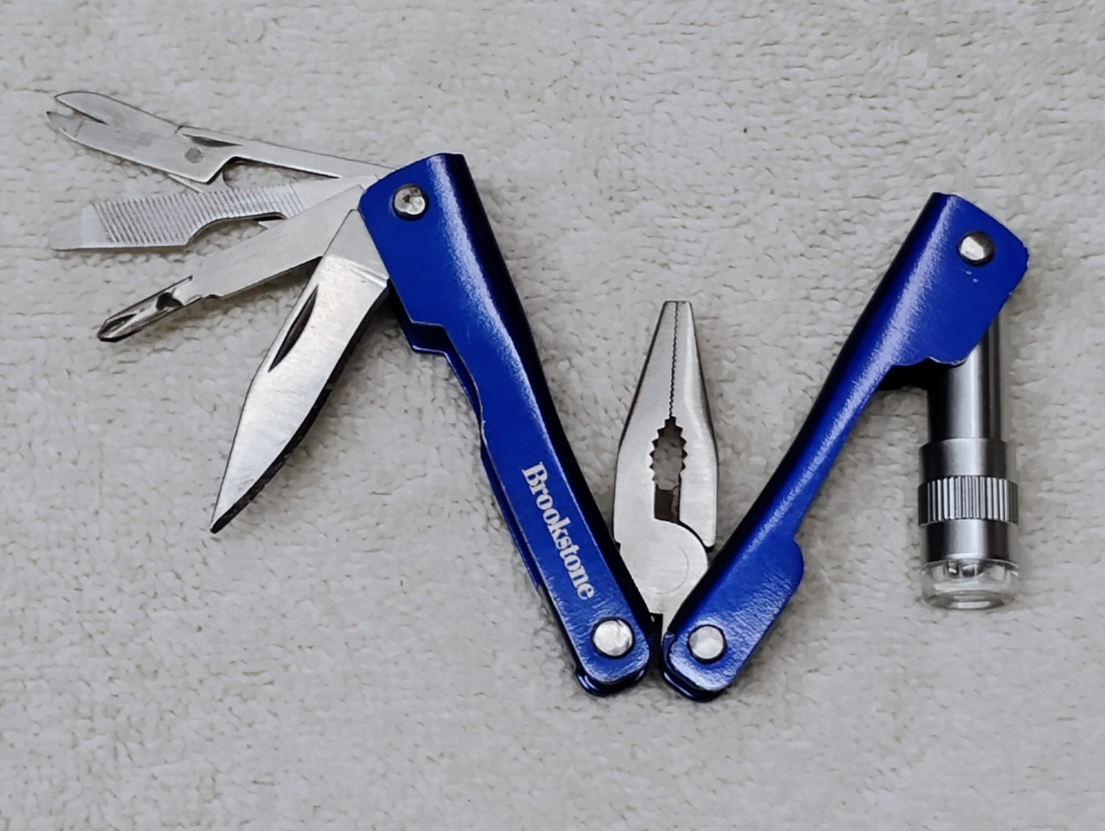 Brookstone Pocket Knife Multi 7+ Function Tool Led Light Key Compact Mini Pliers
