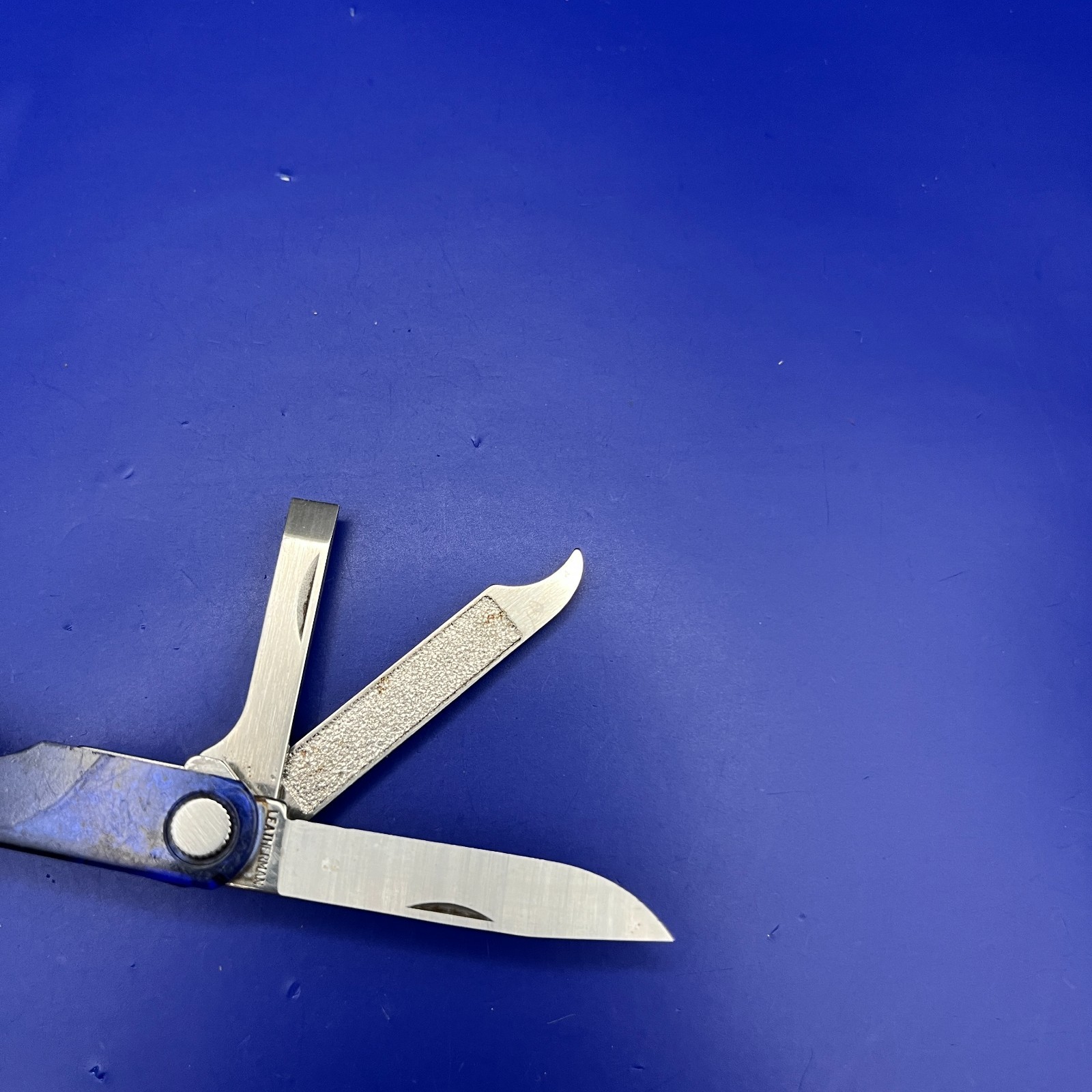 Leatherman Micra Multi-Tool Knife, Scissors- Translucent Blue