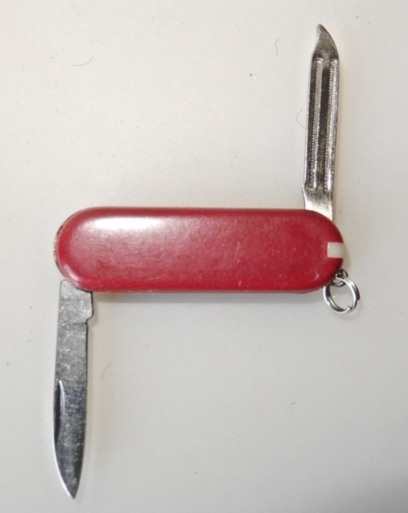 Unbranded Chinese Knock-Off red multitool, tweezers, toothpick