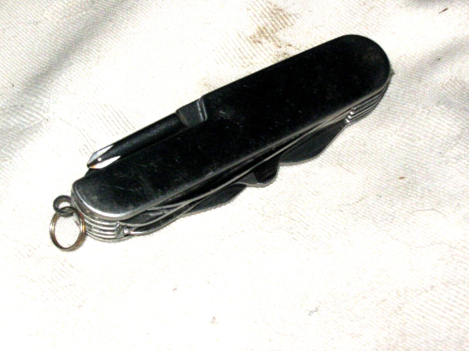 A Small 16-in-1 Stainless Steel Multi Function Tool Pocket Knife