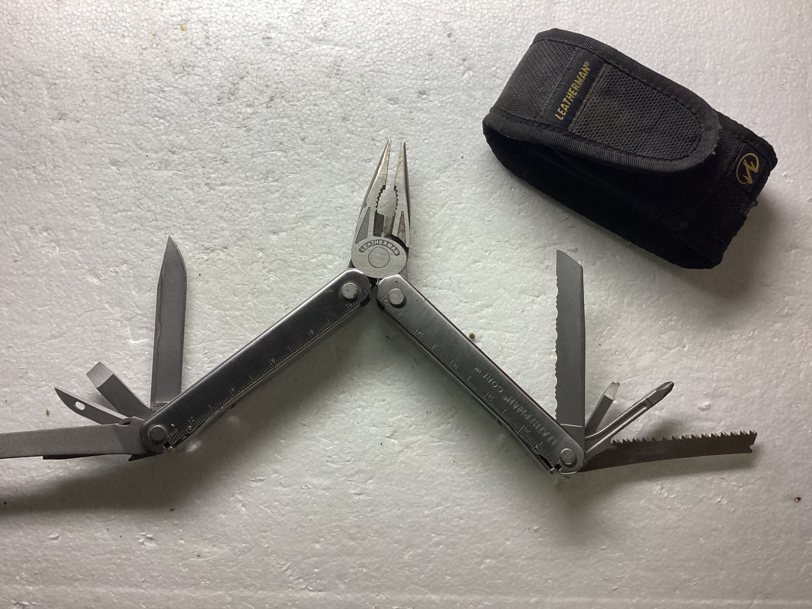 VINTAGE LEATHERMAN CORE MULTITOOL with nylon case.