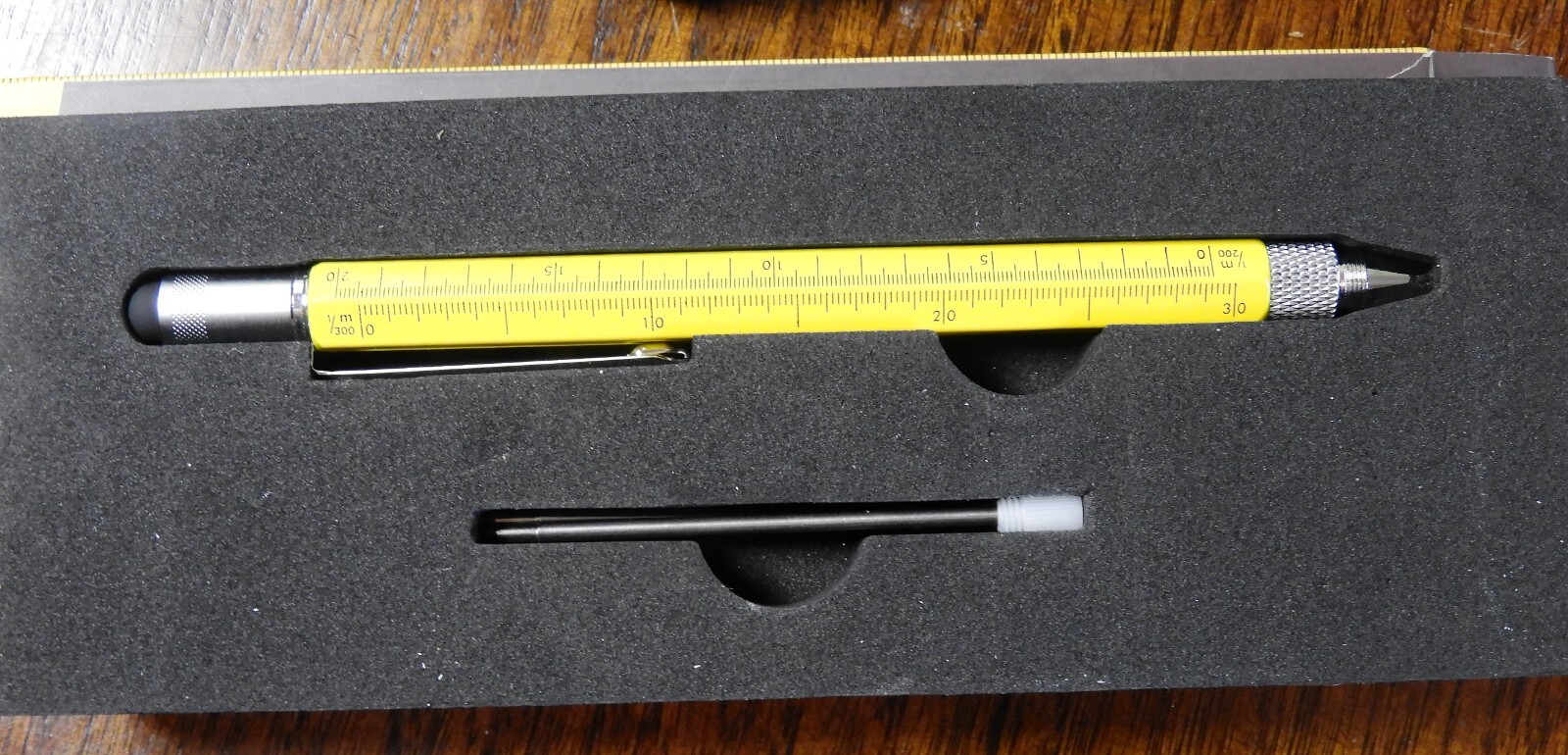 6 in 1 multitool pen monkey on the picture yellow pen ruler bubble level
