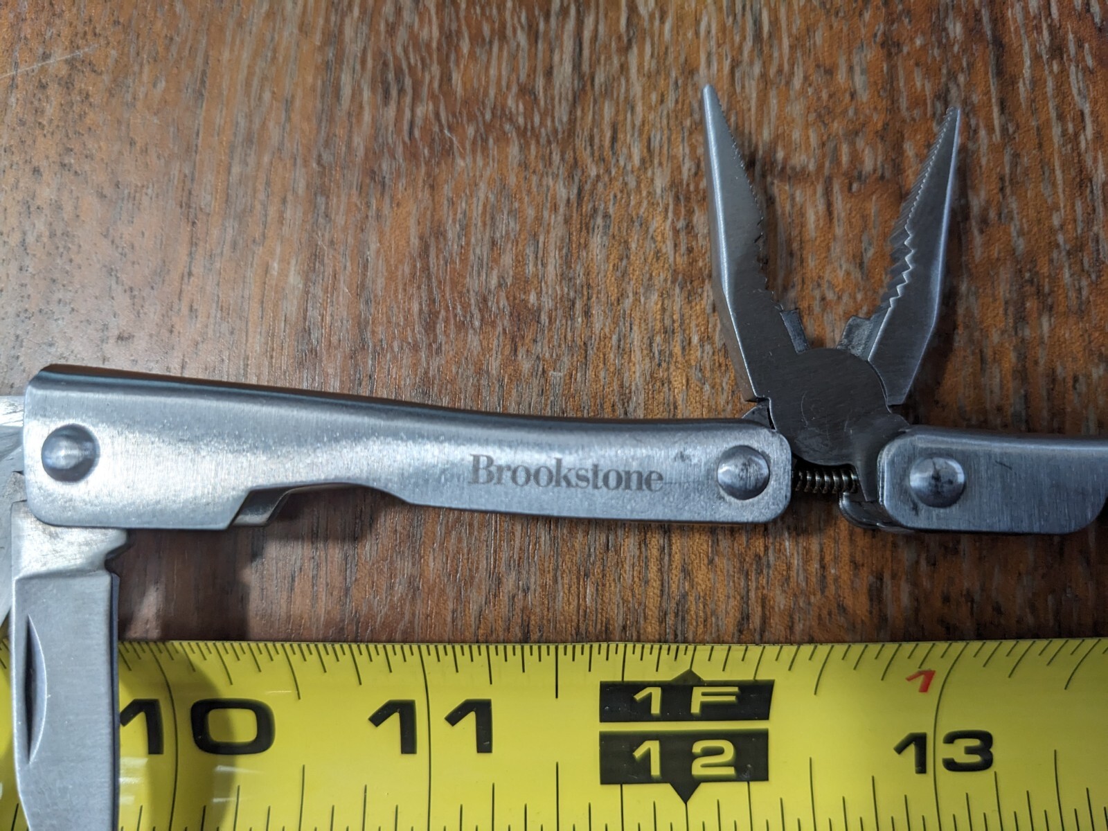 Brookstone Pocket Knife Multi 7+ Function Tool Led Light Key Compact Mini Pliers