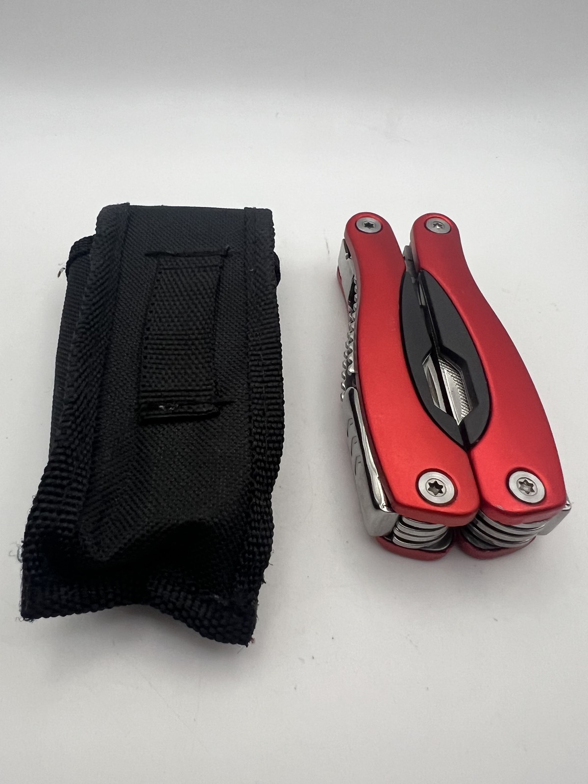 Pro-Grade Multi Tool Folding Pocket Pliers Knife Saw File Bottle Opener with Cas
