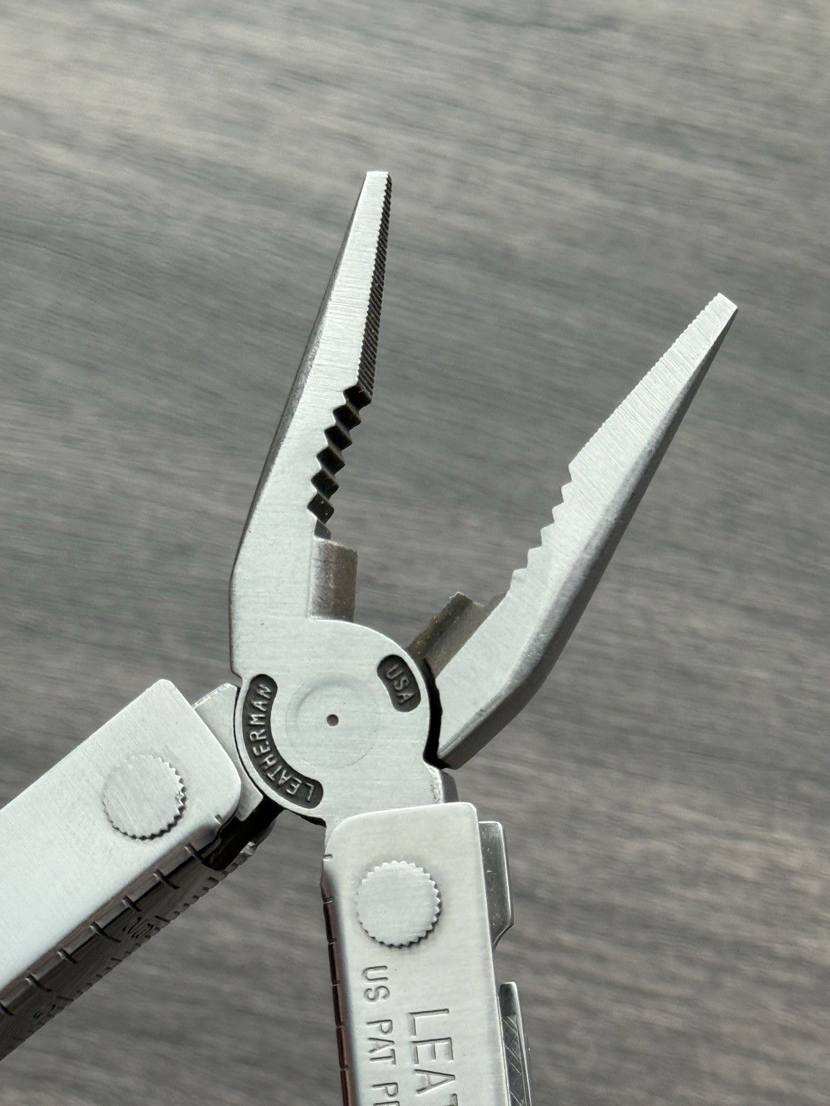 Leatherman MINI TOOL multitool. US PAT PEND w/Pliers Precision Alignment Hole!