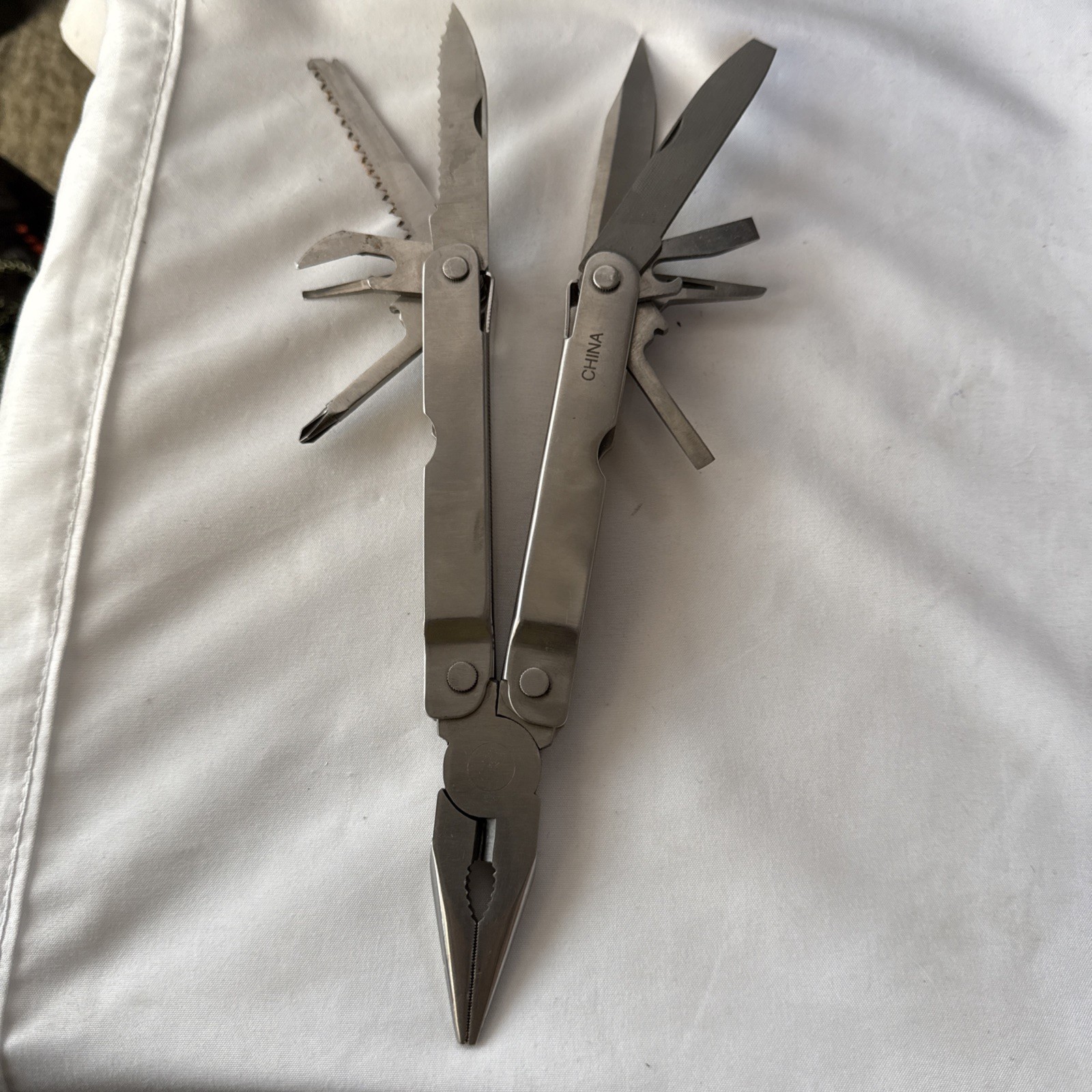 Tool Shop, multitool 13 tools plus!!! Nice tool!!! Not branded Stainless Steel