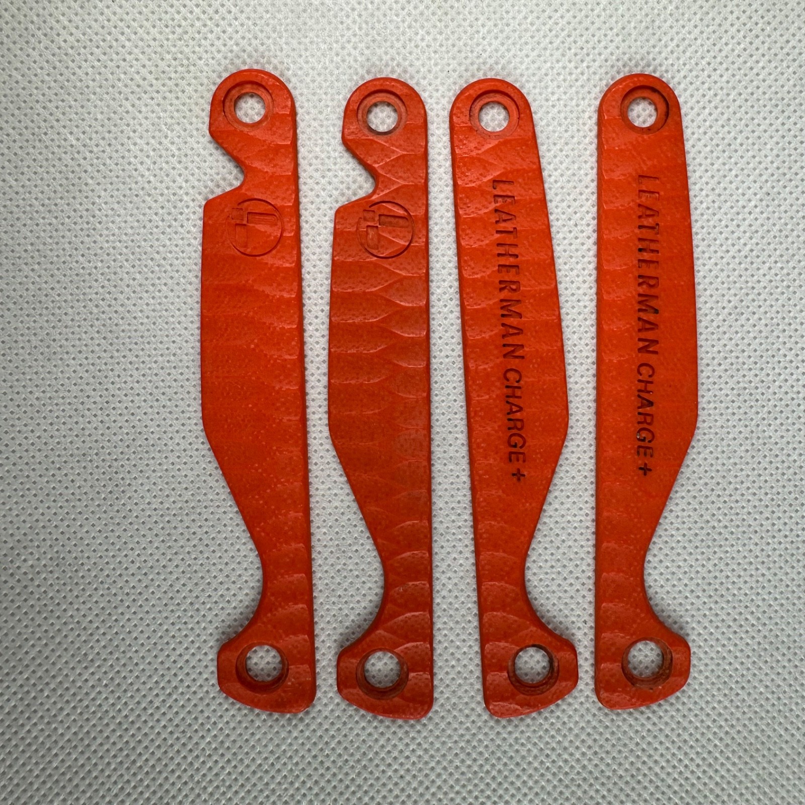 Parts from Orange G10 Leatherman Charge+: 1 Part for Mods or Repairs