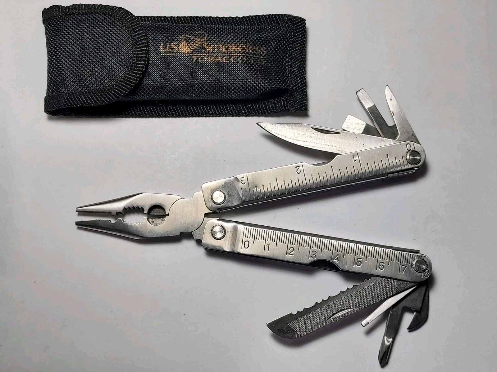 Nylon Pouch advertising US Smokeless Tobacco with Multi Tool – Pliers, Blade
