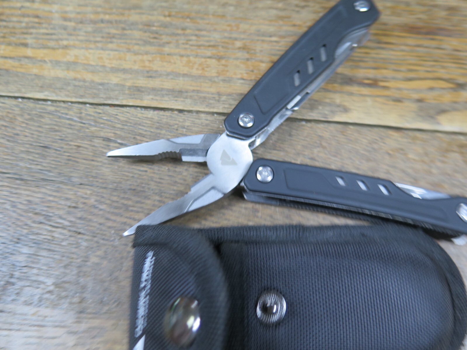 Ozark Trail Multitool Spring Loaded Pliers BLACK HANDLE WITH SHEATH