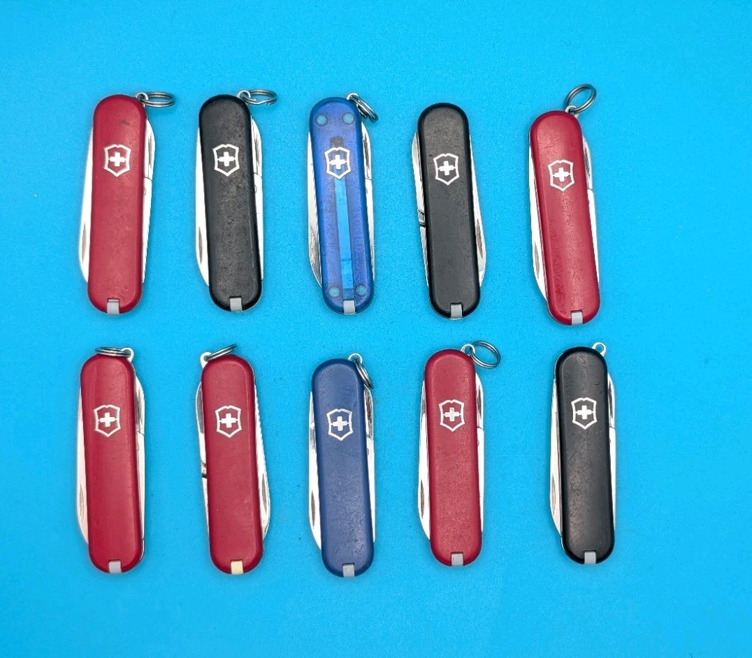 Lot of 10 Victorinox Classic Swiss Army Knife Multi Tools!