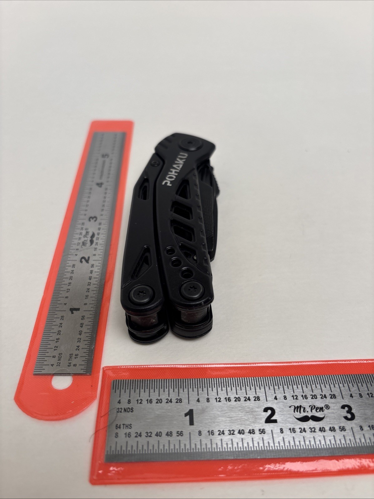 POHAKU BLACK MULTI-TOOL WITH PLIERS, KNIFE, SAW, FILE, SCREWDRIVERS