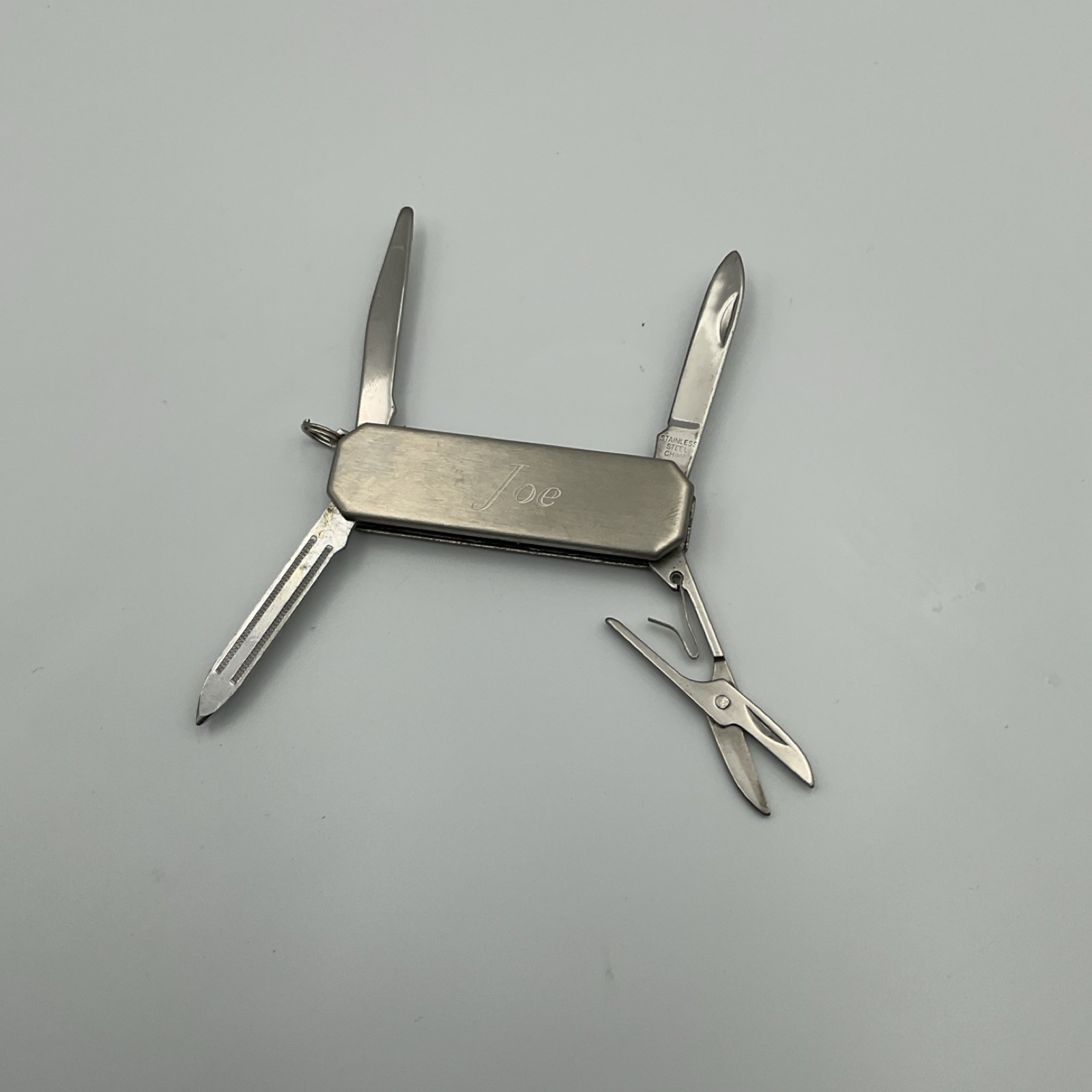 Silver Stainless Steel Multi-Tool Knife, Scissors, File, Screwdriver Pocket Tool