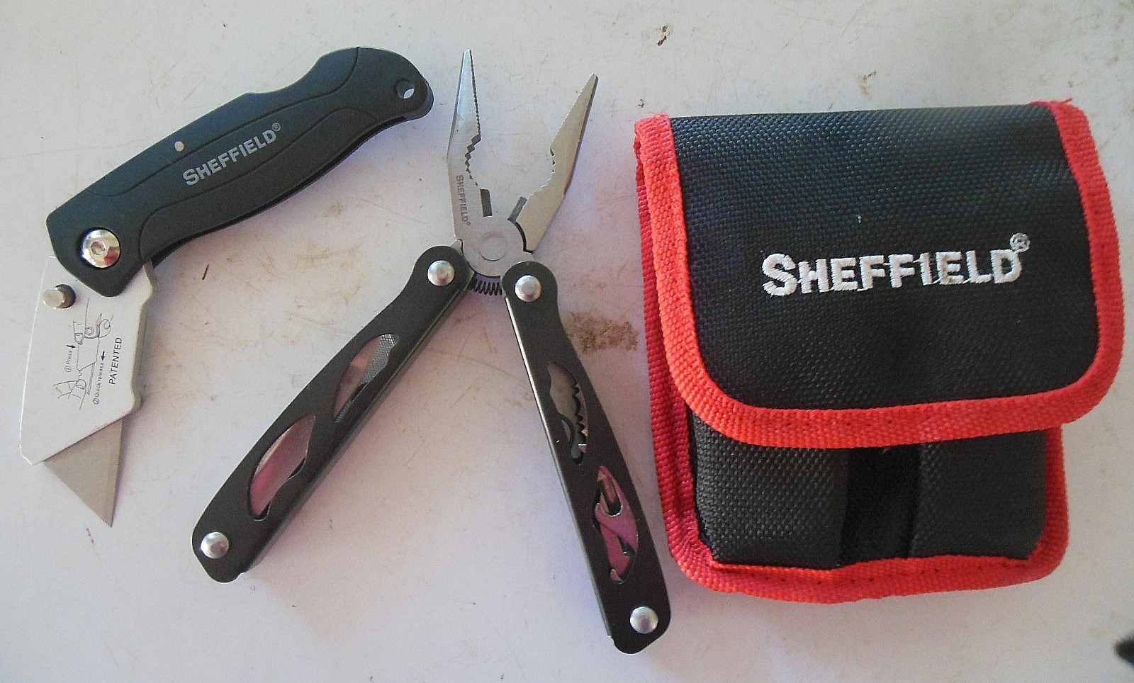 SHEFFIELD STAINLESS STEEL FOLDING PLIERS & MULTI TOOL PLUS UTILITY KNIFE & POUCH